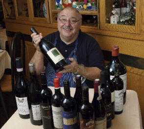 Wood-fired pizza and rustic pasta on a table